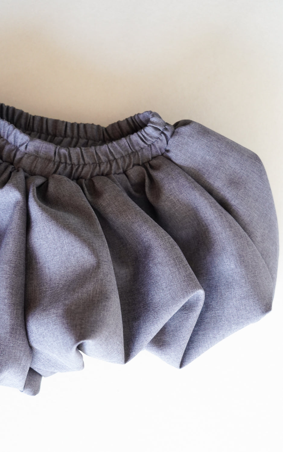 SHORT GLOBITO GRIS